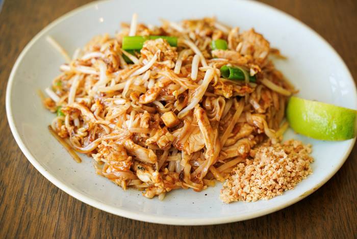 Image of a pad thai on a white plate